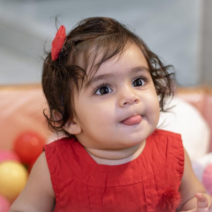 Alex Carter, Lead Design Curator at Silent Mountain Association, reviewing corporate floral arrangements